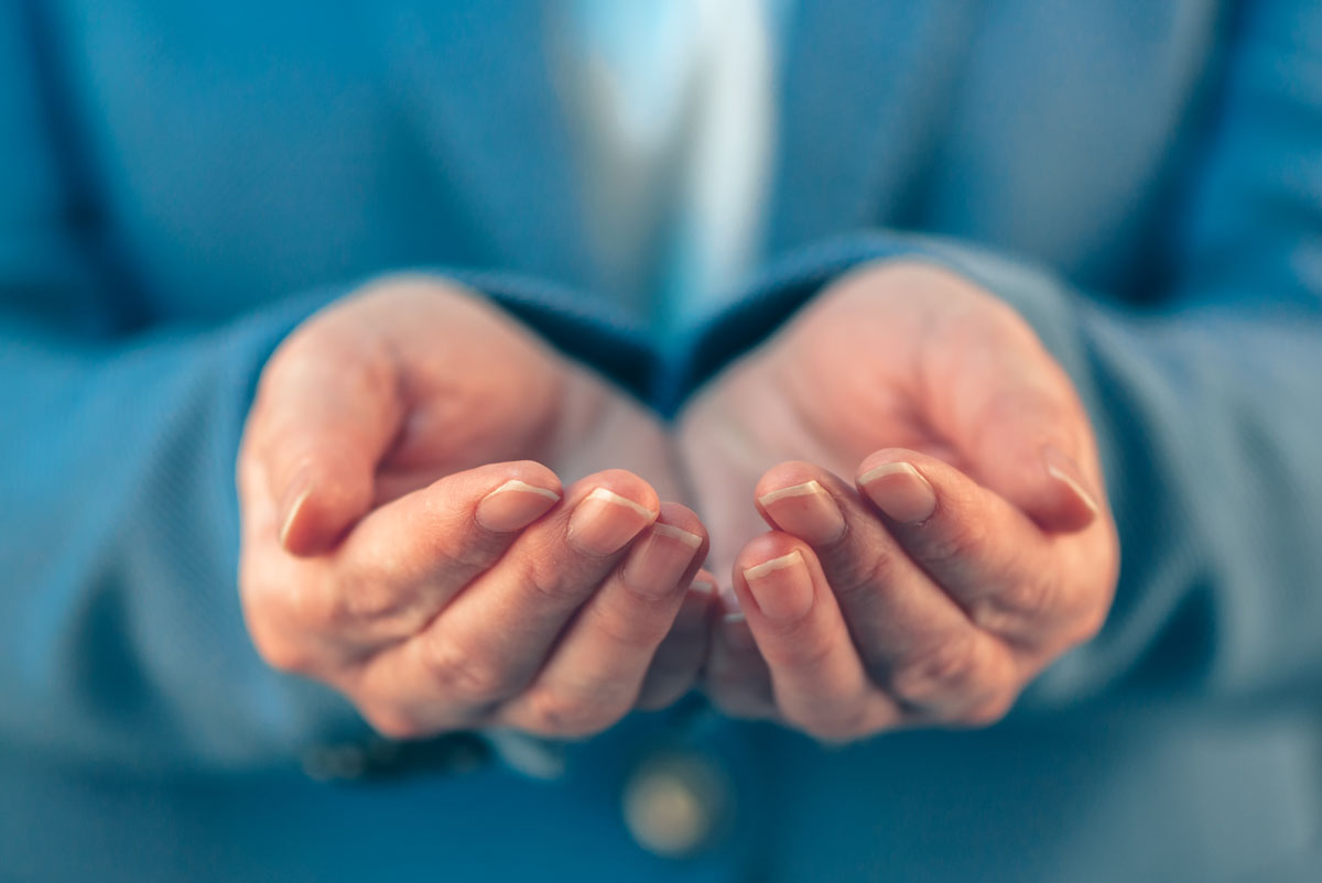  businesswoman-with-open-palms-of-her-hands