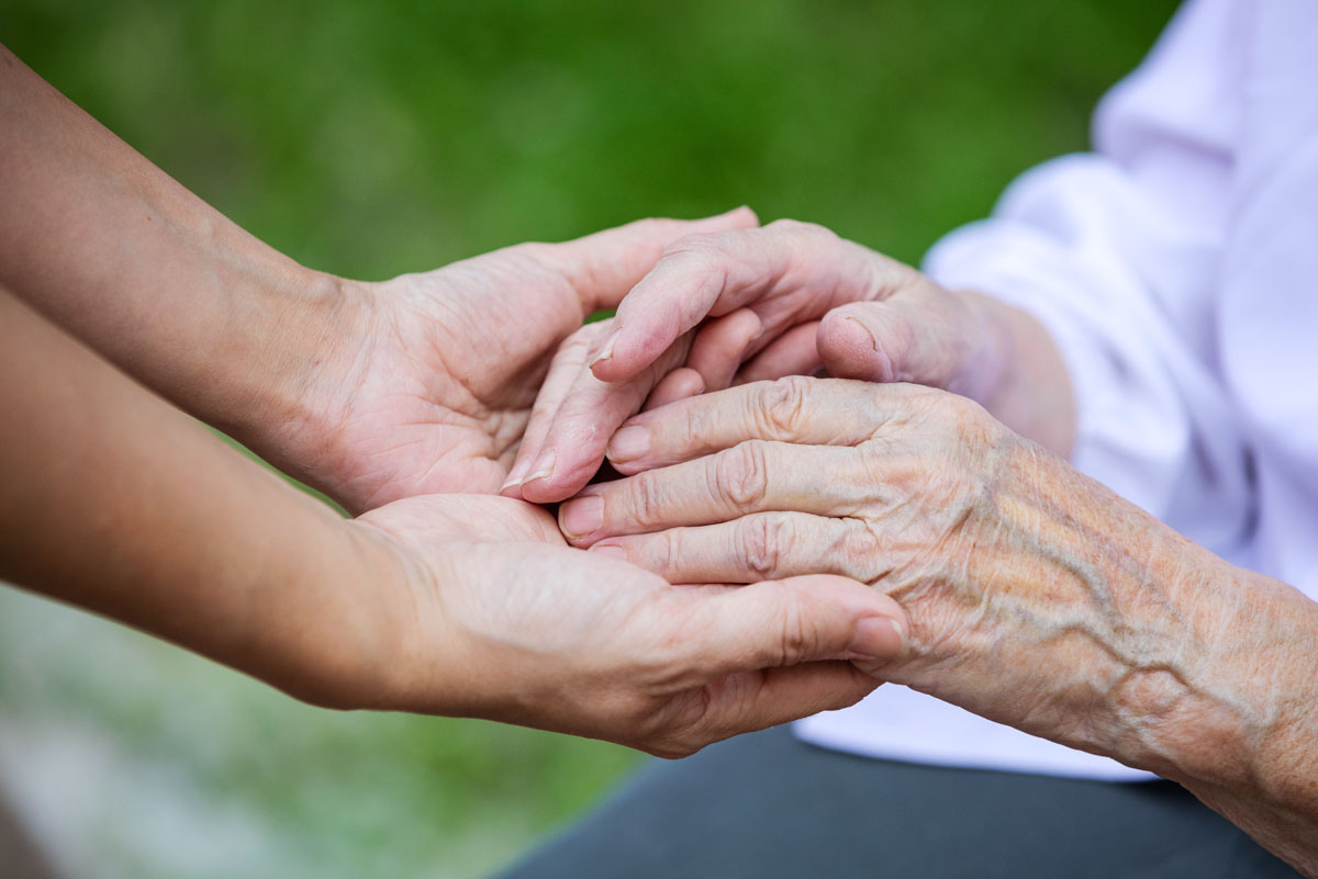 hands-of-young-adult-and-senior-women