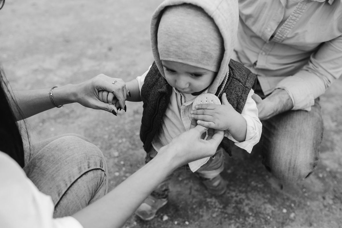 happy-young-family-with-a-little-boy-in-nature